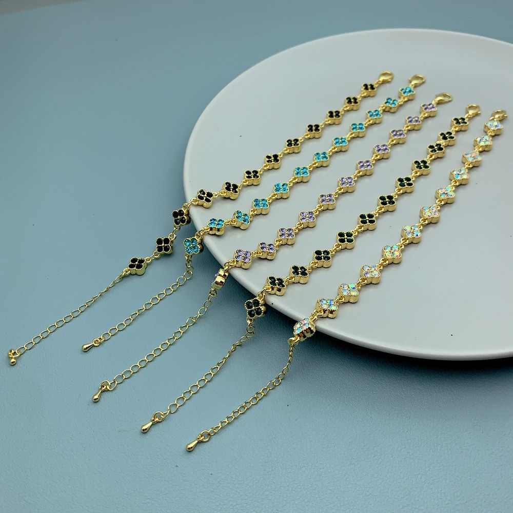 Bracelet trèfle à quatre feuilles en cristal pour femme – Bracelet porte-bonheur doré avec strass