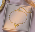 Bracelet nœud femme acier inoxydable doré & argenté – Bijou fin élégant et intemporel